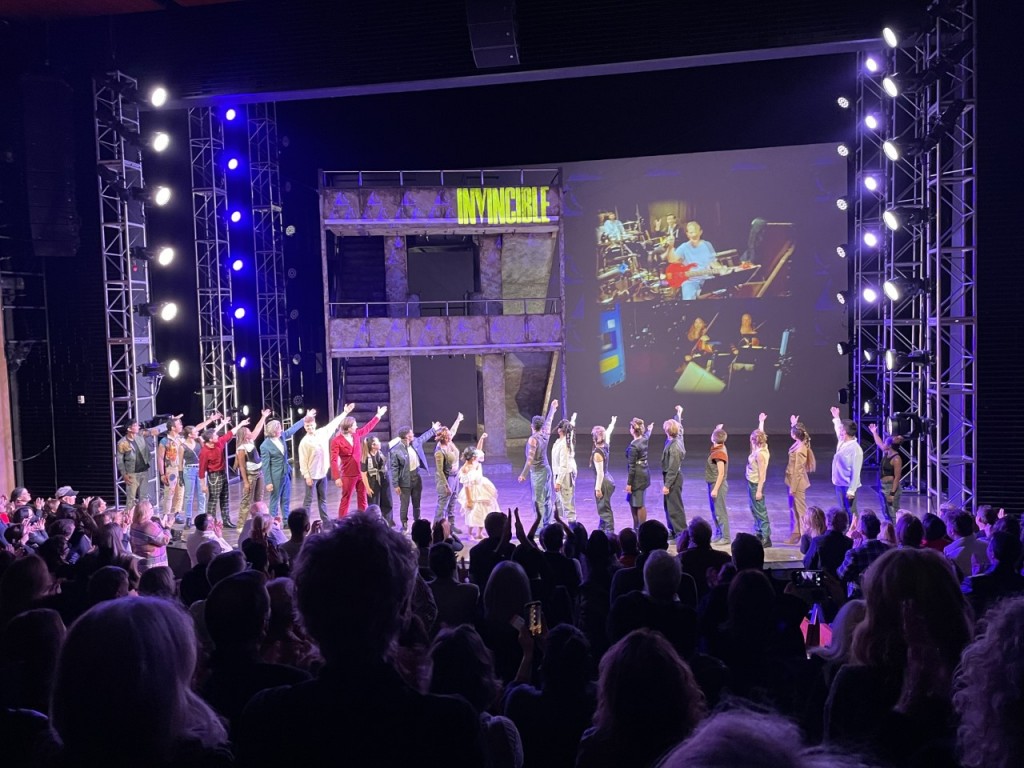 The cast acknowledging the unseen-during-the-show orchestra at the Invincible Opening Night curtain call. Photo by Karen Salkin.