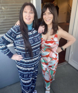 Karen Salkin, (in her mandated pajamas,) and Heidi Rotbart, (being fancier as the hostess.) Photo by Mr. X.
