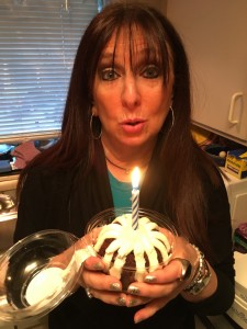 Karen Salkin on a recent birthday, hoping you'll help her wishes come true this year. Photo by Mr. X.