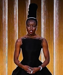 Apparently, Danai Gurira didn't care if the people sitting behind her could see the show or not! Photo by Karen Salkin.