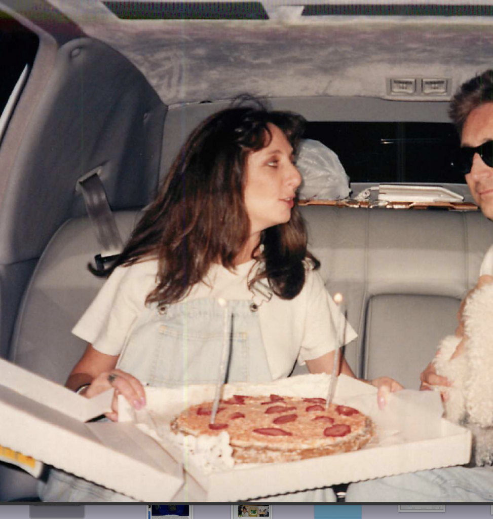 Karen Salkin and her Pizza Cake, with cameos by Mr. X and Clarence, the Singing Dog. Photo by Peter Meahan.