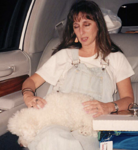 Karen Salkin asleep in the limo on the way home with Clarence, rocking her pizza earrings. (which are the raison d'etre for showing you this pic!) Photo by Jeanine Anderson.