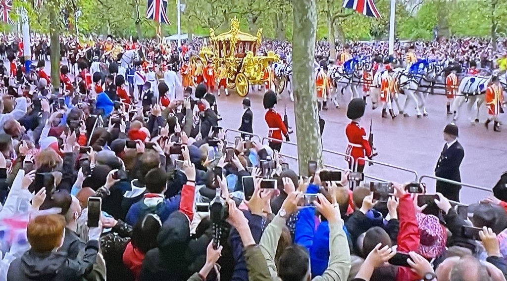 The procession featuring the golden carriage. Photo by Karen Salkin.