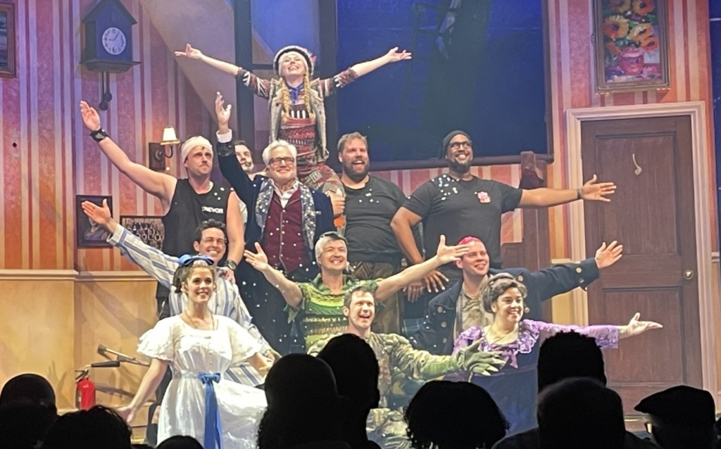 The main cast curtain call, with guest Narrator Bradley Whitford in the center, (with the white hair.) Photo by Karen Salkin.