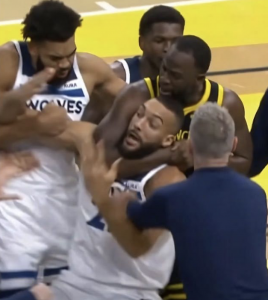 Draymond Green putting Rudy Gobert in a chokehold this week.  (I guess you can figure-out who is who.)