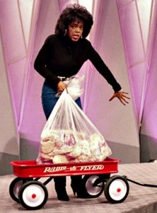 Oprah Winfrey and her bag of animal fat. Ewwww.