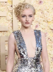 And here's the worst offender in the no-tan-and-crazy-bare-chest category, Julia Garner.