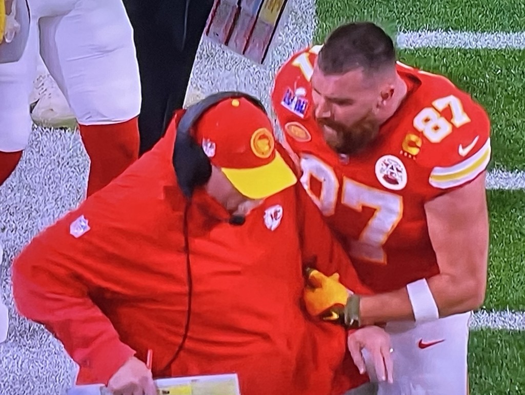 Travis Kelce shoving and screaming at his sixty-five-year-old coach, Andy Reid, because he wasn't in on a play! Disgraceful! Photo by Karen Salkin.
