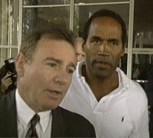 Attorney Howard Weitzman with OJ Simpson the day after the murders. The look on Weitzman's face says he knows that OJ committed the brutal killings.
