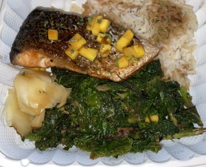The Grilled Salmon dinner, still looking yummy even in a take-out container! Photo by Karen Salkin.