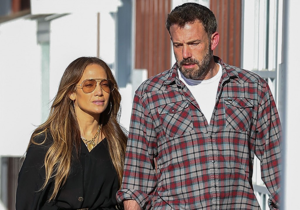 Jennifer Lopez and Ben Affleck. It's a tad weird that they always look miserable, but are still holding hands!