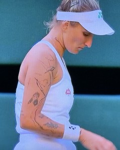 Marketa Vondrousova's odd tats. Photo by Karen Salkin.