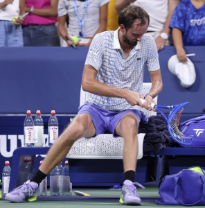 Daniil Medvedev smashing his racket after his first round loss.