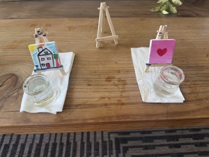 The mini paintings of Karen Salkin, on the left, and Laura Saul, on the right. Photo by Karen Salkin.