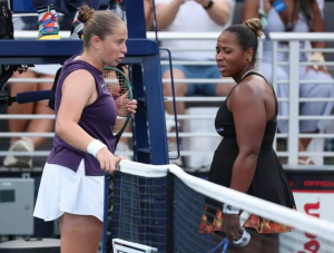 Jelena Ostapenko and Taylor Townsend arguing at the net after their match.
