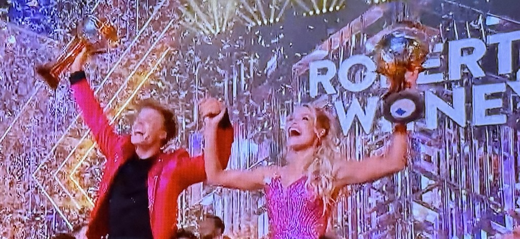 Robert Irwin and Witney Carson with their Mirrorball Trophies. Photo by Karen Salkin.