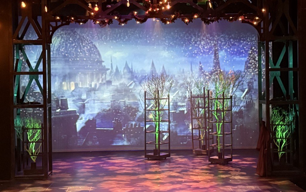 The set before it begins, where one of the gorgeous  projections sets the scene. Photo by Karen Salkin.