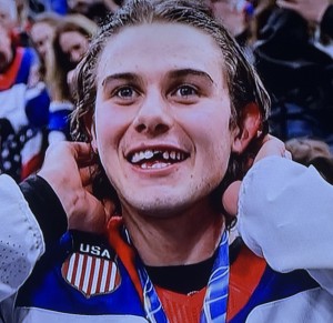 Let's close with a lasting image of the 2026 Winter Olympics: young USA Hockey hero being so happy despite losing that front tooth! Photo by Karen Salkin.