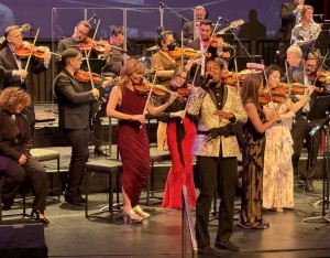 Brandon Victor Dixon singing his heart out in front. Photo by Karen Salkin.