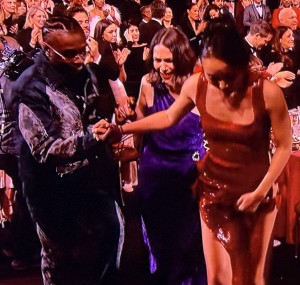 Miles Caton helping his co-stars up to the stage. Photo by Karen Salkin.