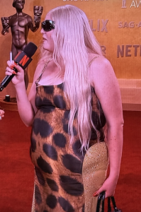 The Miss Piggy doppelgänger Megan Stalter. Notice her visible panty line. And more importantly, the cigarette in her hand. How offensive! Photo by Karen Salkin! 