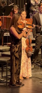 Alyssa Park, on the left, playing the gazillion-year-old Stradivarius. Photo by Karen Salkin.