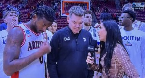 Lauren Shehadi on the right, interviewing the Arizona coach and players who had just won their game, despite looking so sad! Photo by Karen Salkin.