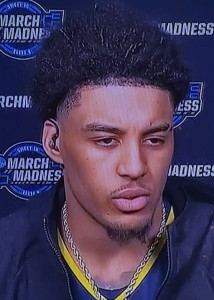 Yaxel Lendeborg looking serious after he got hurt. Photo by Karen Salkin.