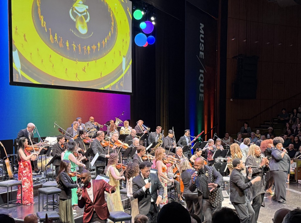 The finale, with all the singers along the front. Photo by Karen Salkin.