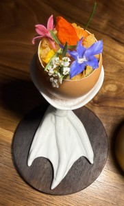 The special and colorful Uni Egg, (the only time you'll see the e-word written-out in this e-zine!) It's on the menu of auxiliary choices, and is served in a decorative cup that Ronnie says looks like a pelican foot! Photo by Ronnie Hazel, Jr.