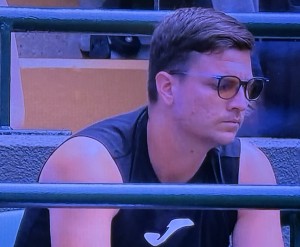 Miomir Kecmanović watching his friend play after losing his own match the day before! That's basically unheard of! Photo by Karen Salkin.